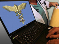 Image of person accessing medical records on laptop